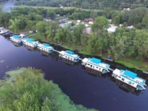 houseboats docked on river